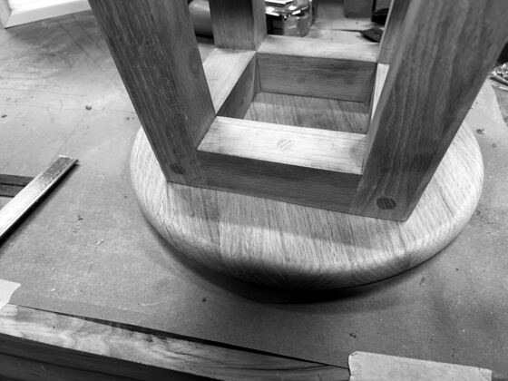 Black-and-white photograph of bar stool joinery